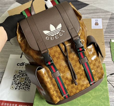 adidas x gucci hardside trunk.